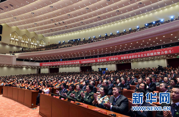 10月1日，慶祝中華人民共和國成立66周年暨新疆維吾爾自治區(qū)成立60周年大會在新疆人民會堂隆重舉行。這是大會會場。 新華社記者 饒愛民攝 
