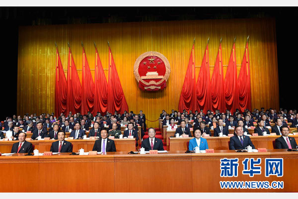 10月1日，慶祝中華人民共和國成立66周年暨新疆維吾爾自治區(qū)成立60周年大會在新疆人民會堂隆重舉行。 新華社記者 饒愛民 攝