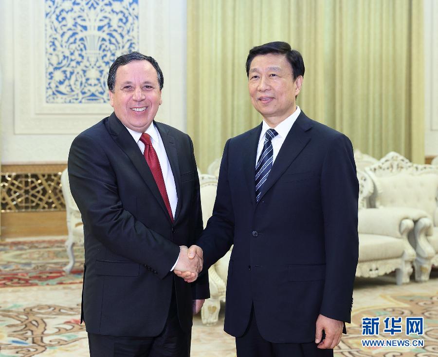 7月20日，國(guó)家副主席李源潮在北京會(huì)見突尼斯外長(zhǎng)杰希納維。新華社記者王曄攝