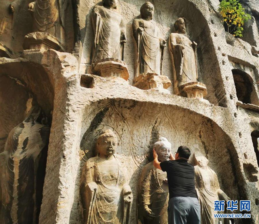 （圖文互動）（4）合體了，龍門石窟流散佛首首次實現(xiàn)“數(shù)字復(fù)位”