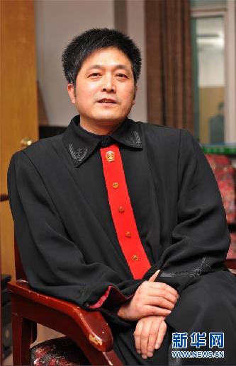 （圖文互動(dòng)）其人如蘭，既潔且馨——追記“全國(guó)模范法官”胡國(guó)運(yùn)