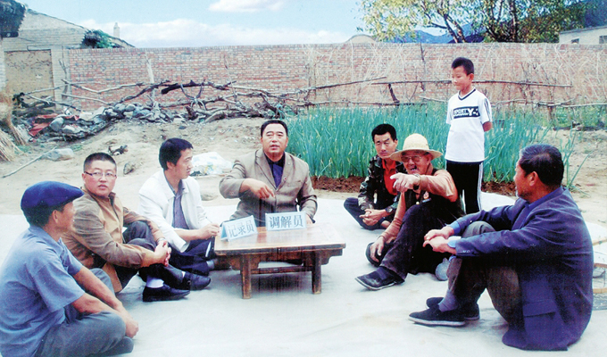 調(diào)解“家長(zhǎng)里短，雞毛蒜皮”的小事情是李培斌從事的大事業(yè)