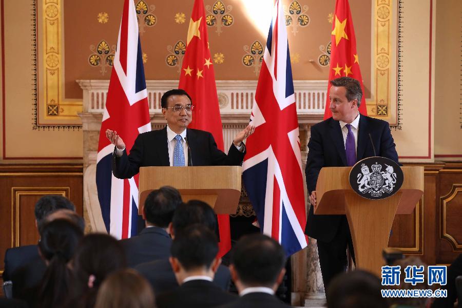 6月17日，國(guó)務(wù)院總理李克強(qiáng)同英國(guó)首相卡梅倫在倫敦舉行中英總理年度會(huì)晤后共同會(huì)見記者。新華社記者 龐興雷 攝
