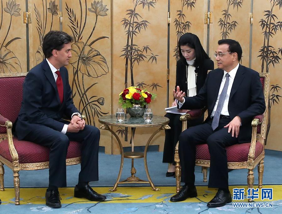 6月18日，國務(wù)院總理李克強在倫敦會見英國工黨領(lǐng)袖埃德·米利班德。新華社記者 龐興雷 攝