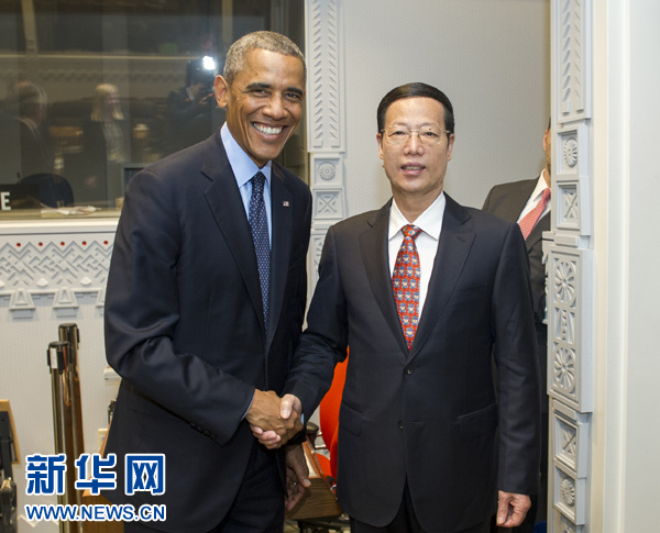 9月23日，國家主席習(xí)近平特使、國務(wù)院副總理張高麗在紐約會見出席聯(lián)合國氣候峰會的美國總統(tǒng)奧巴馬。 新華社記者王曄攝