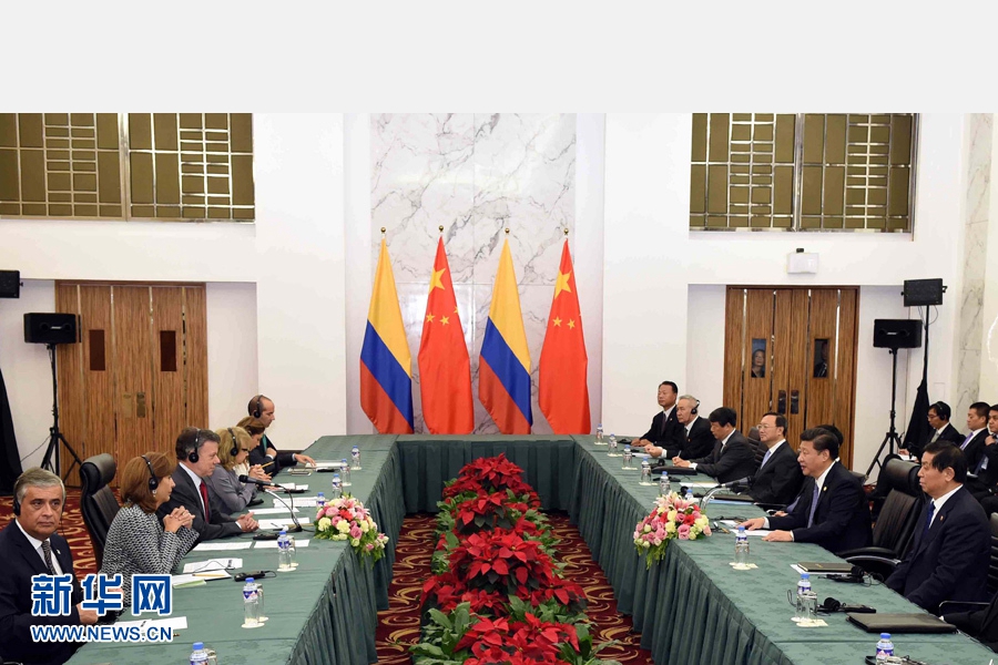 11月18日，國家主席習(xí)近平在菲律賓馬尼拉會見哥倫比亞總統(tǒng)桑托斯。 新華社記者 饒愛民 攝