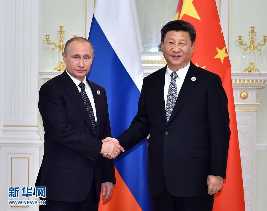 6月23日，國家主席習(xí)近平在烏茲別克斯坦塔什干會(huì)見俄羅斯總統(tǒng)普京。新華社記者李濤攝
