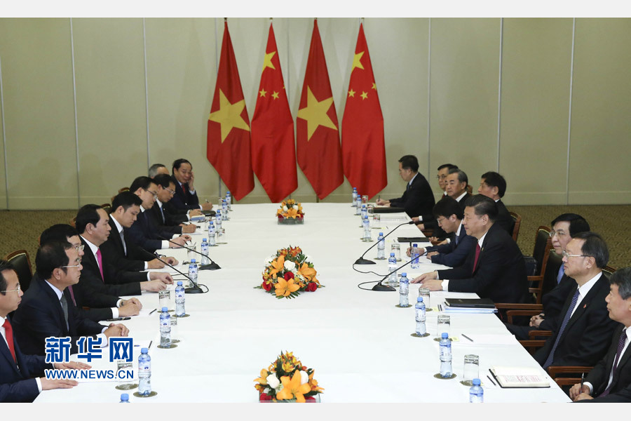 11月19日，國家主席習近平在利馬會見越南國家主席陳大光。新華社記者 龐興雷 攝 