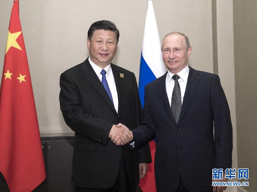 6月8日，國(guó)家主席習(xí)近平在阿斯塔納會(huì)見(jiàn)俄羅斯總統(tǒng)普京。 新華社記者蘭紅光 攝